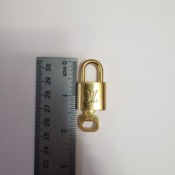 Louis Vuitton Gold Padlock with Key - Picture 2 of 12